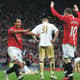 Carlitos Tevez e Wayne Rooney nos tempos de Manchester United