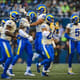 Jogadores dos Rams celebram jogada da equipe durante vitória sobre o Seattle Seahawks