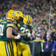 Jogadores do Green Bay Packers celebram touchdown marcado sobre o Chicago Bears