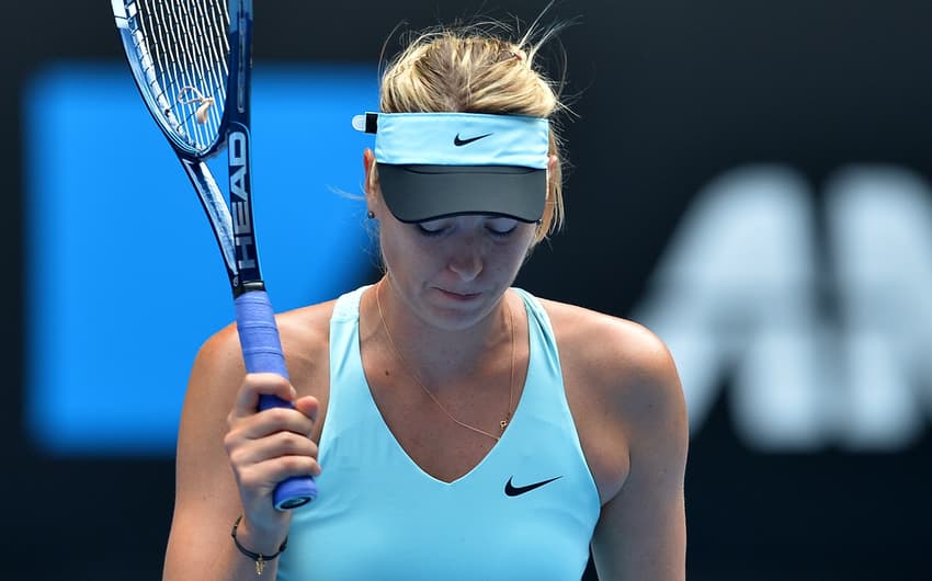 Maria Sharapova durante jogo contra Cibulkova (Foto: Paul Crock/AFP)