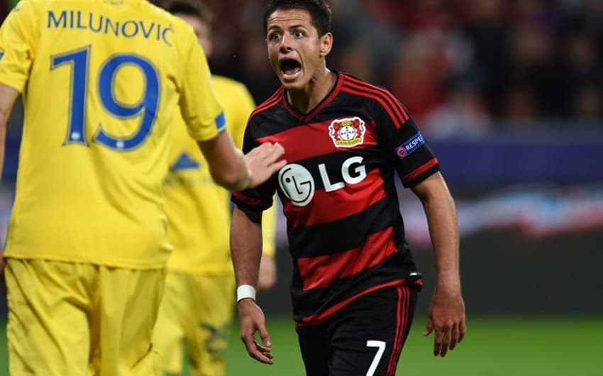 Vice-líder do grupo E, o Bayer Leverkusen tem o melhor ataque da Liga, com 9 gols. Três deles, marcados por Chicharito Hernández (AFP PHOTO / PATRIK STOLLARZ)