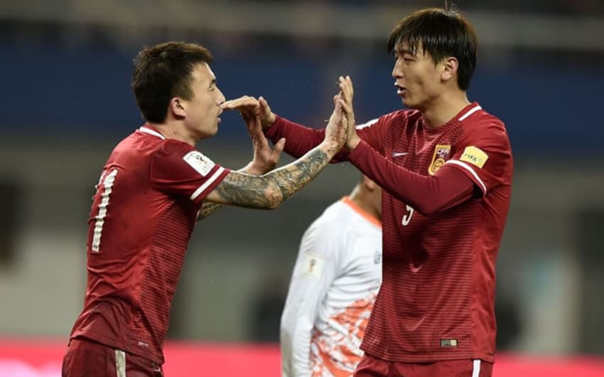 Yang Xu marcou cinco gols na goleada da China (Foto: AFP)