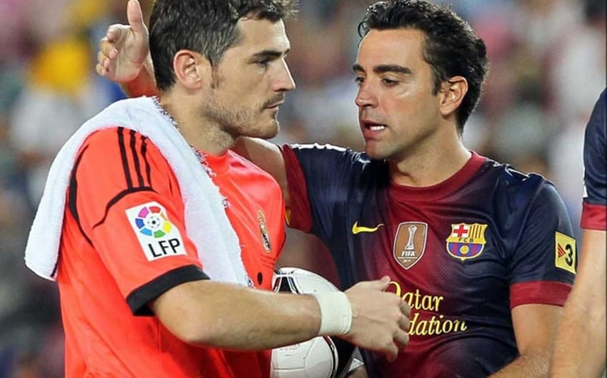 Xavi e Casillas (Foto: AFP)