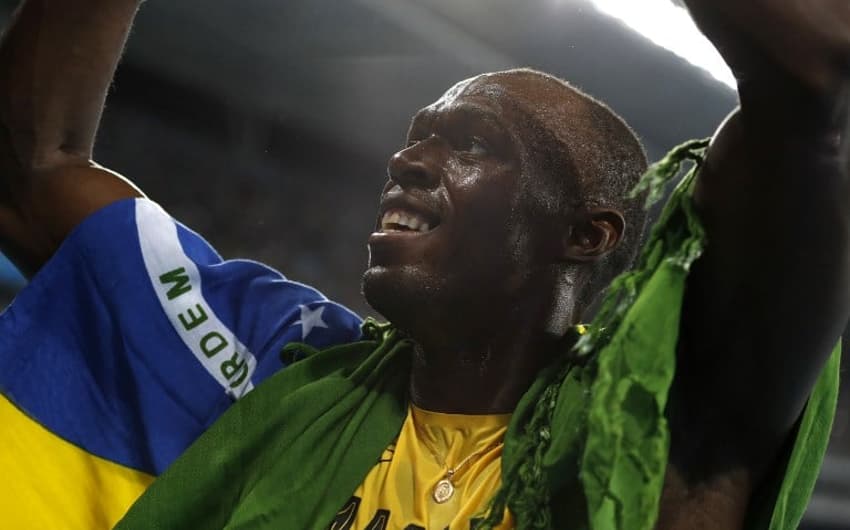 Usain Bolt comemora a conquista da medalha de ouro nos 200 m rasos&nbsp;
