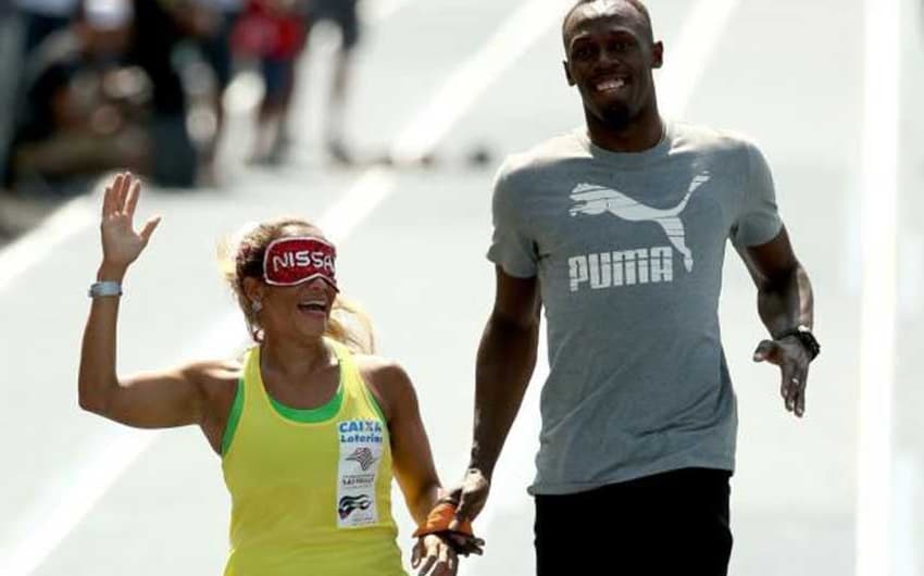 A fundista paralímpica brasileira Terezinha Guilhermina já correu tendo Bolt como seu guia