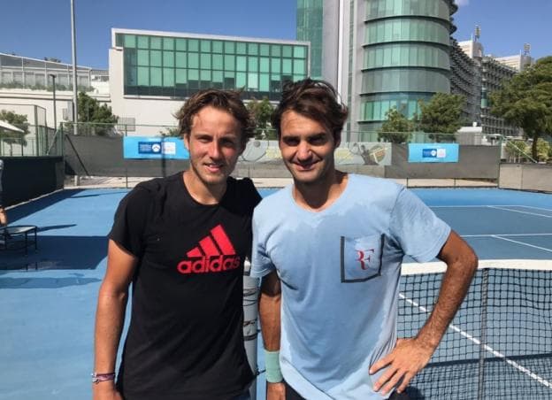 Lucas Pouille e Roger Federer em Dubai