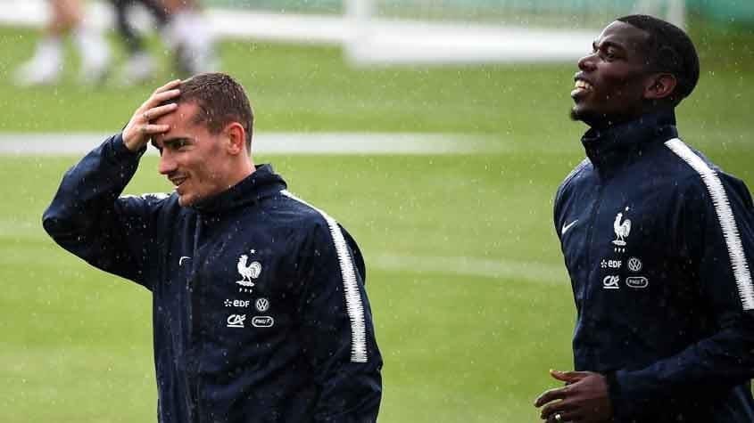 Griezmann com o Pogba