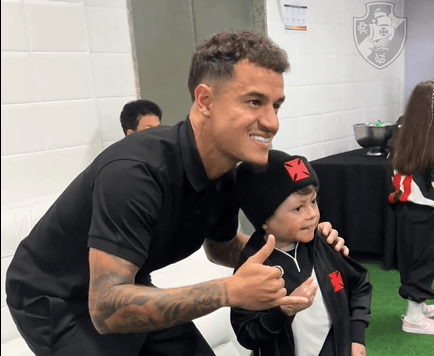 Phillipe Coutinho e Menino Gui