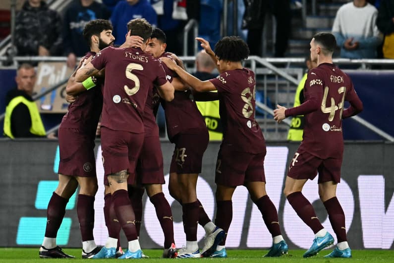 Jogadores do Manchester City contra SK Slovan Bratislava na Champions League 2024/25 (Foto: Joe Klamar / AFP)