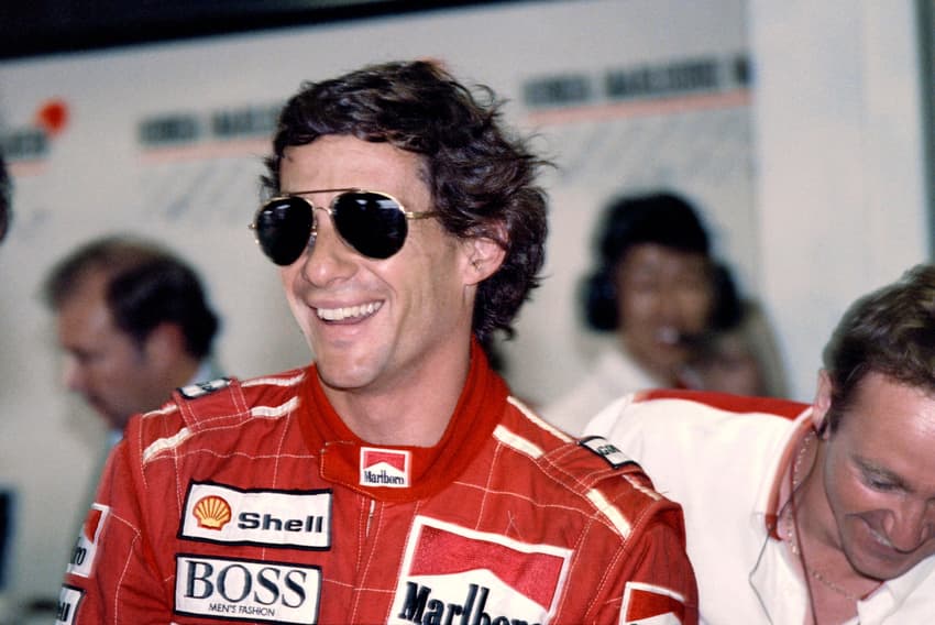 Amigo de Galvão Bueno, Ayrton Senna comemora pole position no GP da Austrália na F1 1991 (Foto: Toshifumi KITAMURA / AFP)