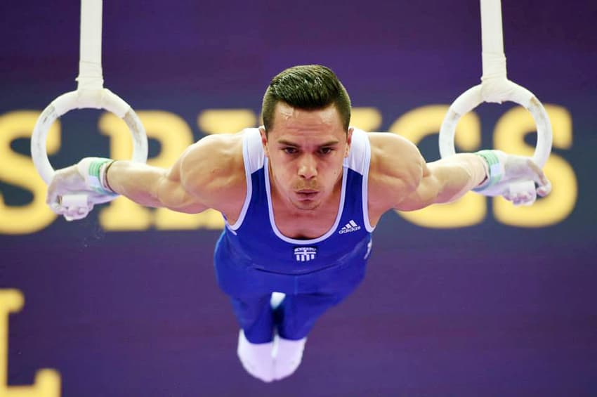 O ginasta grego Lefteris Petrounias, atual campeão mundial nas argolas, abrirá o revezamento da Rio-2016 (Foto: Divulgação)