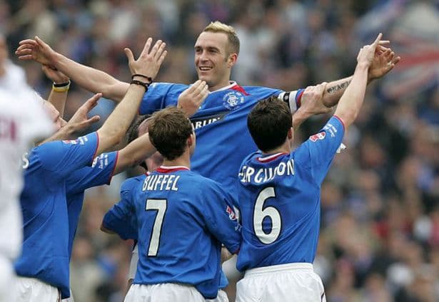 Fernando Ricksen atuando pelo Rangers