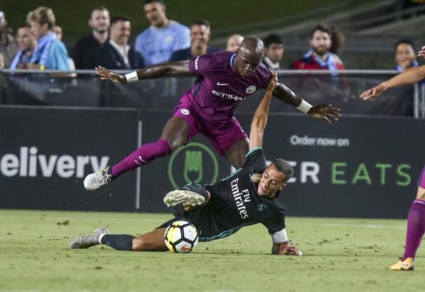 Yaya Touré e Lucas Vázquez - Manchester City x Real Madrid