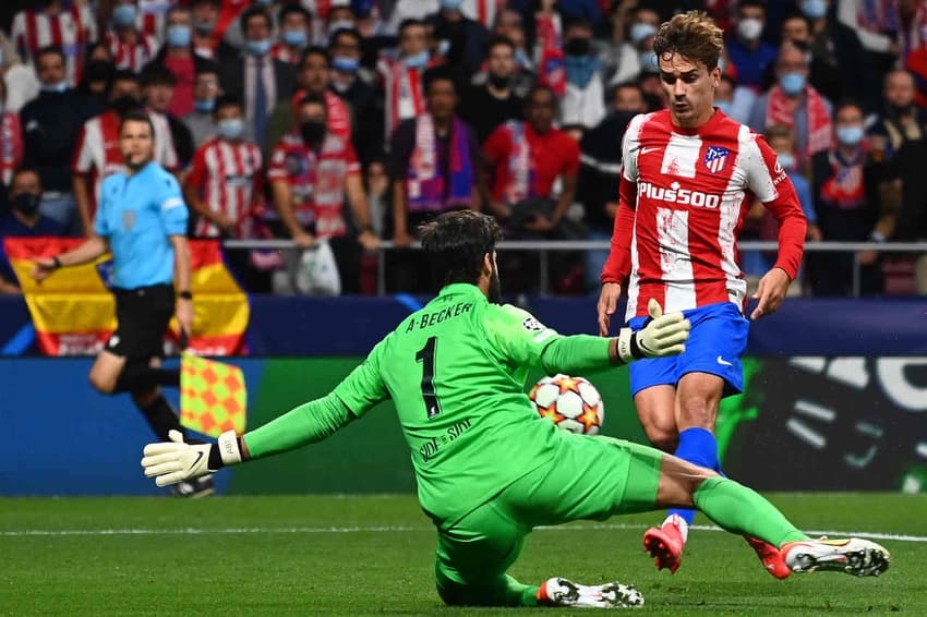 Atlético de Madrid x Liverpool - Alisson e Griezmann