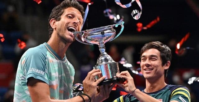 Marcelo Melo e Mackenzie McDonald com o troféu