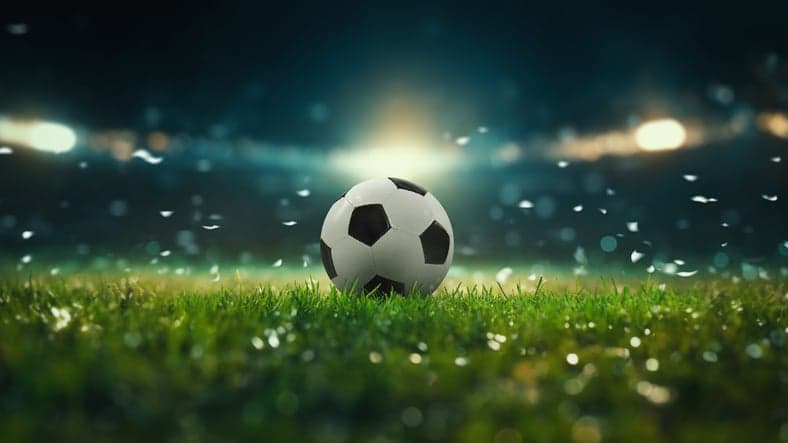 ball on the green field in soccer stadium. ready for game in the midfield – soccer ball close-up.