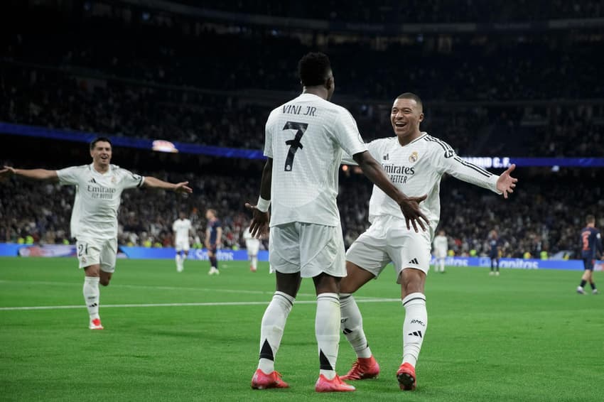 Madrid, Spain. 16th Jan, 2025. Vinicius jr of Real Madrid and Kylian Mbappe of Real Madrid celebrate a goal during the 2024/25 Copa del Rey Round of 16 match between Real Madrid and Celta de Vigo at Santiago Bernabeu Stadium. Final score; Real Madrid 5:2