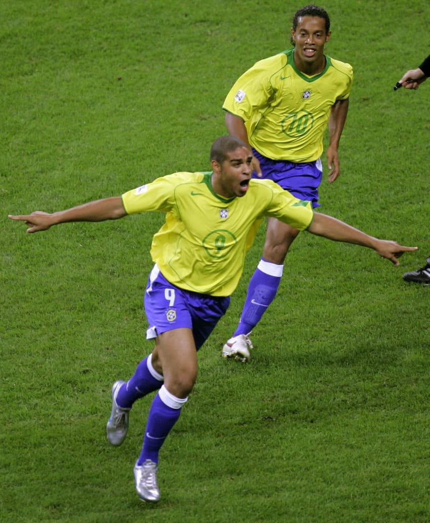 Adriano and Ronaldinho of Brazil run in celebration after Adriano scored a goal against Argentina during Confederations Cup soccer final in Frankfurt