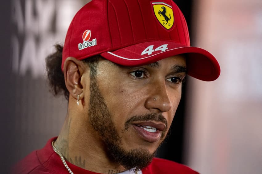 Ferrari's British driver Lewis Hamilton speaks during a TV interview ahead of the 2025 Emilia Romagna Formula One Grand Prix at the Imola autodrome in Imola, on May 15, 2025. (Photo by Andrej ISAKOVIC / AFP)