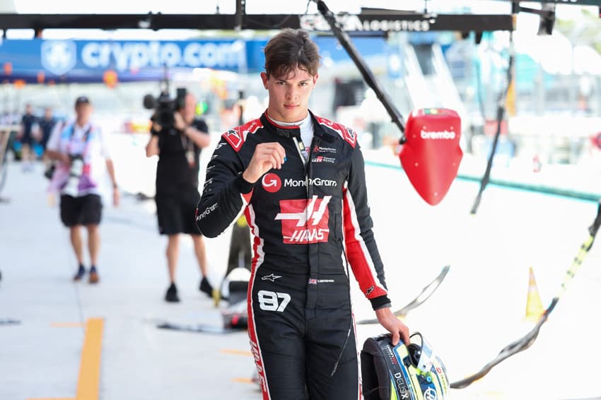 Haas F1 Team's British driver Oliver Bearman walks through pit lane during a practice session for the 2025 Miami Formula One Grand Prix at Miami International Autodrome in Miami Gardens, Florida, on May 2, 2025. (Photo by CHARLY TRIBALLEAU / AFP)