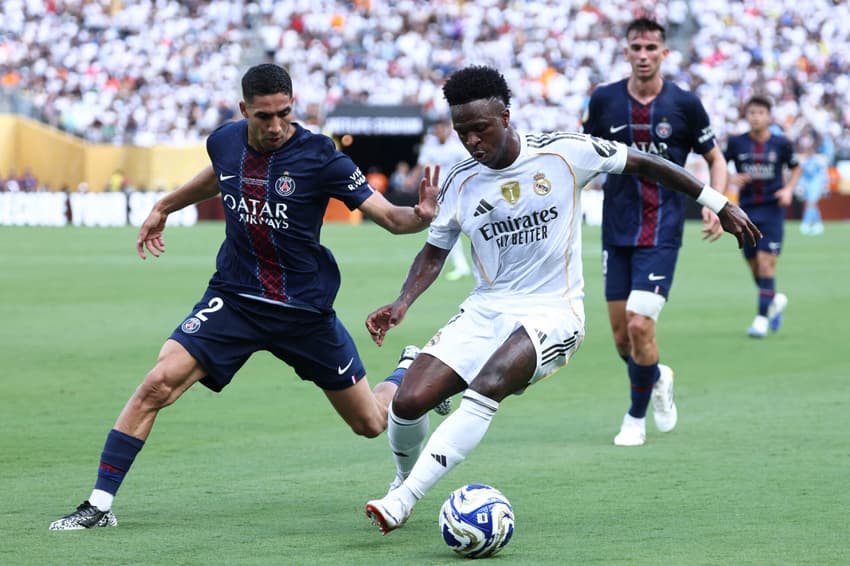 Vini Jr em ação pelo Real Madrid contra o PSG (Foto: FRANCK FIFE / AFP)