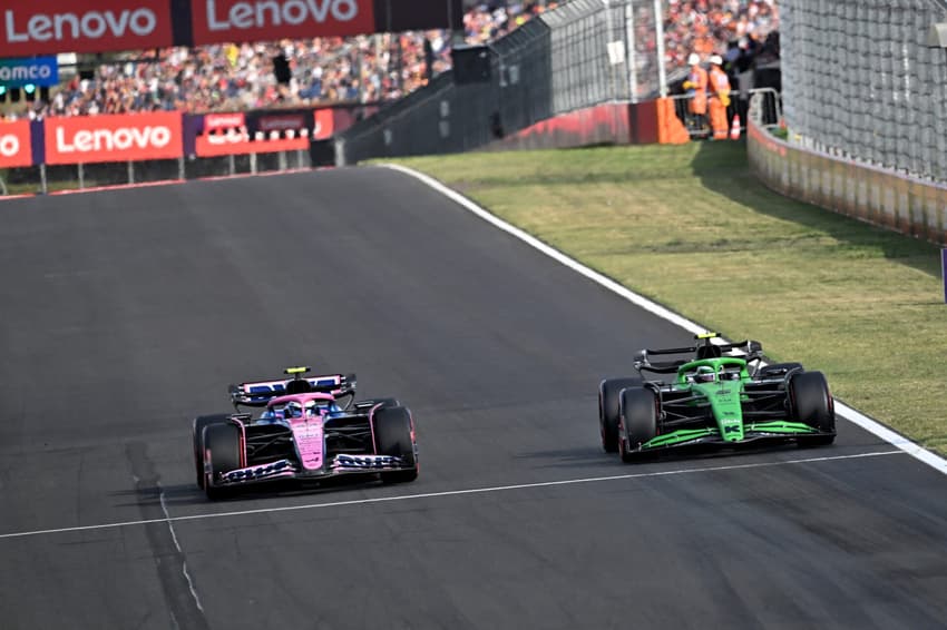 Kick Sauber's Brazilian driver Gabriel Bortoleto and Alpine's Argentinian driver Franco Colapinto drive during the second practice session at the Hungaroring race track near Budapest, Hungary, on August 1, 2025, ahead of the Formula One Hungarian Grand Prix. (Photo by ATTILA KISBENEDEK / AFP)