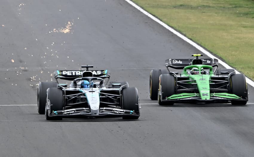 Mercedes' British driver George Russell (L) and Kick Sauber's Brazilian driver Gabriel Bortoleto compete during the Formula One Hungarian Grand Prix at the Hungaroring circuit in Mogyorod near Budapest, Hungary, on August 3, 2025. (Photo by Attila KISBENEDEK / AFP)
