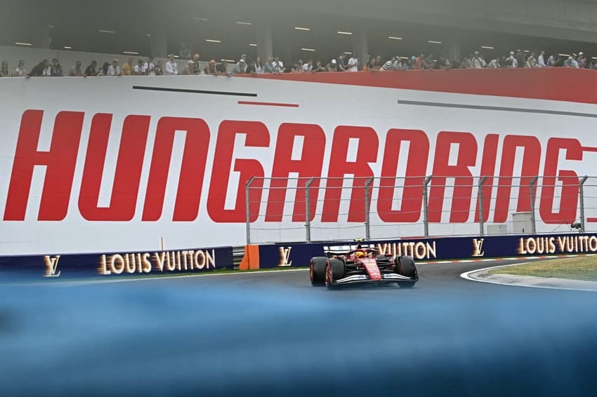 Ferrari' British driver Lewis Hamilton competes during the qualifying session of the Formula One Hungarian Grand Prix at the Hungaroring circuit in Mogyorod, near Budapest, Hungary, on August 2, 2025. (Photo by Attila KISBENEDEK / AFP)