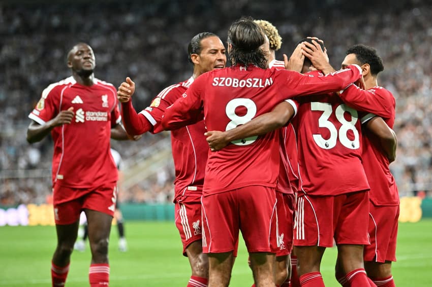 Liverpool's Dutch midfielder #38 Ryan Gravenberch (2R) celebrates with teammates after scoring the opening goal of the English Premier League football match between Newcastle United and Liverpool at St James' Park in Newcastle-upon-Tyne, north east England on August 25, 2025. (Photo by ANDY BUCHANAN / AFP) / RESTRICTED TO EDITORIAL USE. NO USE WITH UNAUTHORIZED AUDIO, VIDEO, DATA, FIXTURE LISTS, CLUB/LEAGUE LOGOS OR 'LIVE' SERVICES. ONLINE IN-MATCH USE LIMITED TO 120 IMAGES. AN ADDITIONAL 40 IMAGES MAY BE USED IN EXTRA TIME. NO VIDEO EMULATION. SOCIAL MEDIA IN-MATCH USE LIMITED TO 120 IMAGES. AN ADDITIONAL 40 IMAGES MAY BE USED IN EXTRA TIME. NO USE IN BETTING PUBLICATIONS, GAMES OR SINGLE CLUB/LEAGUE/PLAYER PUBLICATIONS. /