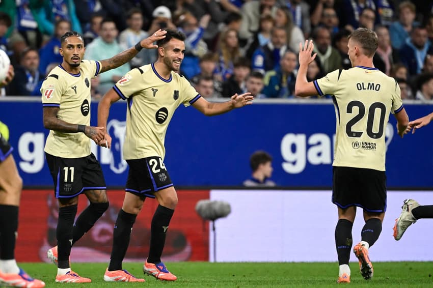 Raphinha comemorando o gol de Eric García (Foto: Miguel Riopa/AFP)