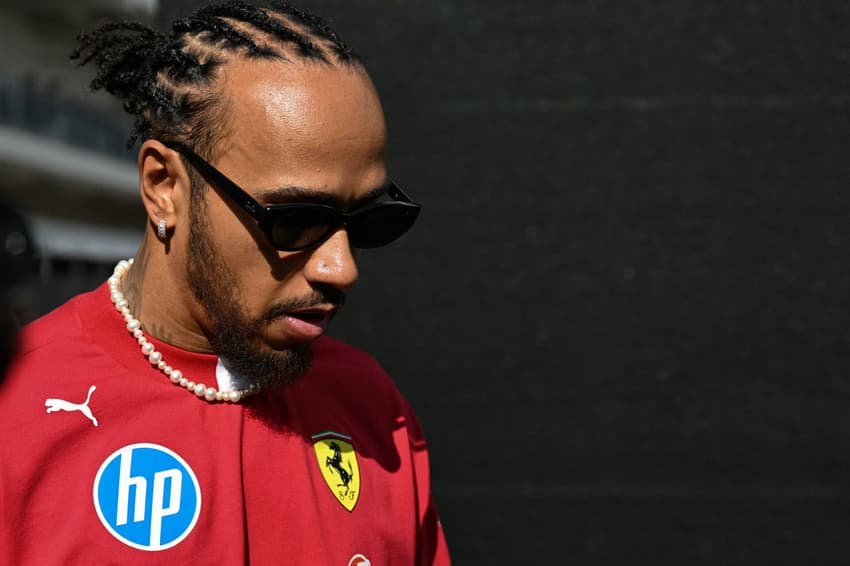 Ferrari's British driver Lewis Hamilton arrives for the practice session for the United States Formula One Grand Prix at the Circuit of the Americas in Austin, Texas, on October 17, 2025. (Photo by Jim WATSON / AFP)