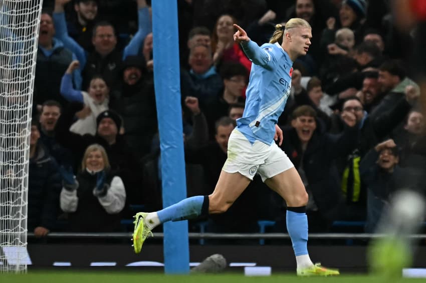 Jogos de hoje: o Manchester City entra em campo para enfrentar o Borussia Dortmund pela Champions League (Foto: Paul ELLIS / AFP)