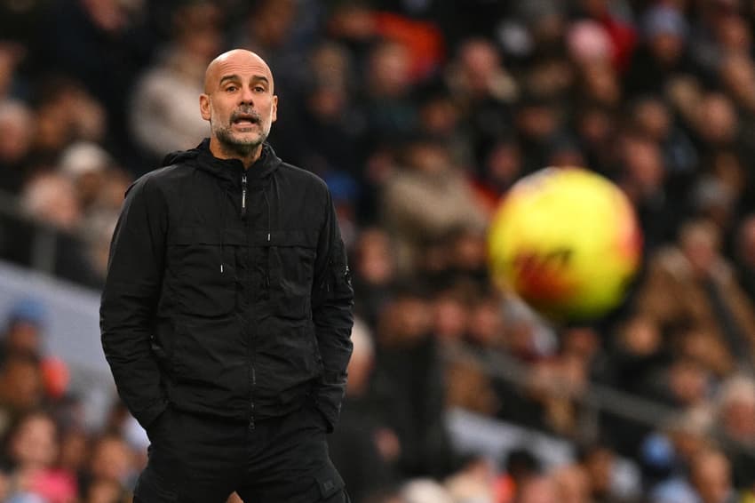 Pep Guardiola é treinador do Manchester City (Foto: Oli SCARFF / AFP)