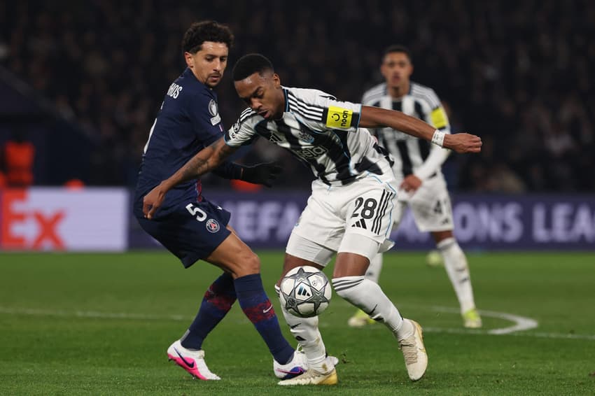 Marquinhos, do PSG, e Willock, do Newcastle, em ação no duelo pela 8ª rodada da Champions League (Foto: Franck FIfe/AFP)