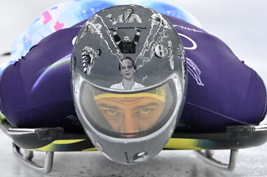 O ucraniano Vladyslav Heraskevych participa do treino masculino de skeleton no Cortina Sliding Centre durante os Jogos Olímpicos de Inverno Milano Cortina 2026, em 11 de fevereiro de 2026. (Foto: Tiziana Fabi/AFP)