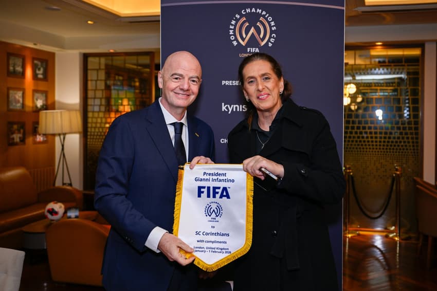 LONDON, ENGLAND - FEBRUARY 1: FIFA President Gianni Infantino and Corinthians women football director  Iris Sesso during a gift exchange at the FIFA Women's Champions Cup 2026 Final match between Arsenal Women FC and SC Corinthians at Arsenal Stadium on February 1, 2026 in London, United Kingdom. (Photo by Stuart Wilson - FIFA/FIFA via Getty Images)