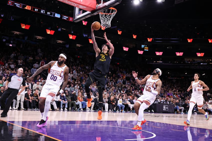 Gui Santos em jogo entre Golden State Warriors e Phoenix Suns na NBA (Foto: Chris Coduto/Getty Images/AFP)