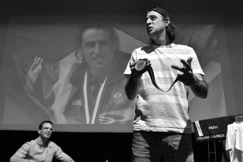 André Kfouri e Fernando Meligeni em uma das palestras (Reprodução)