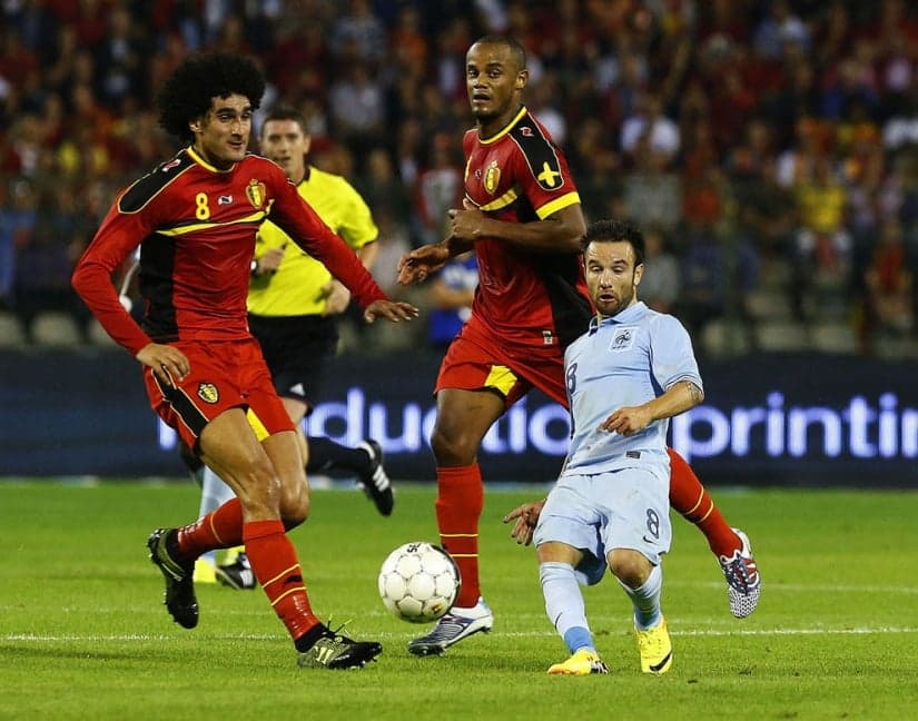 Fellaini, Kompany e Valbuena no amistoso entre França e Bélgica, em 2013 (Foto: Yves Herman/Reuters)