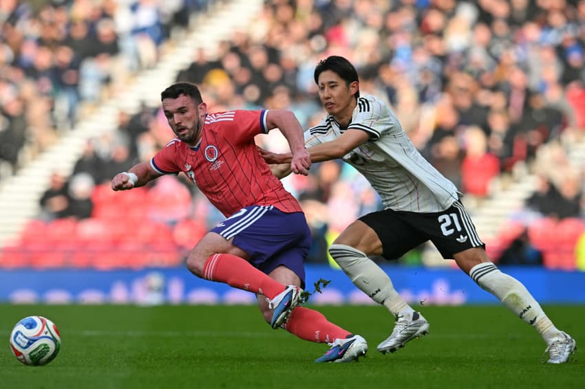 Adversário do Brasil na Copa do Mundo, a Escócia perdeu para o Japão por 1 a 0 (Foto: ANDY BUCHANAN / AFP)