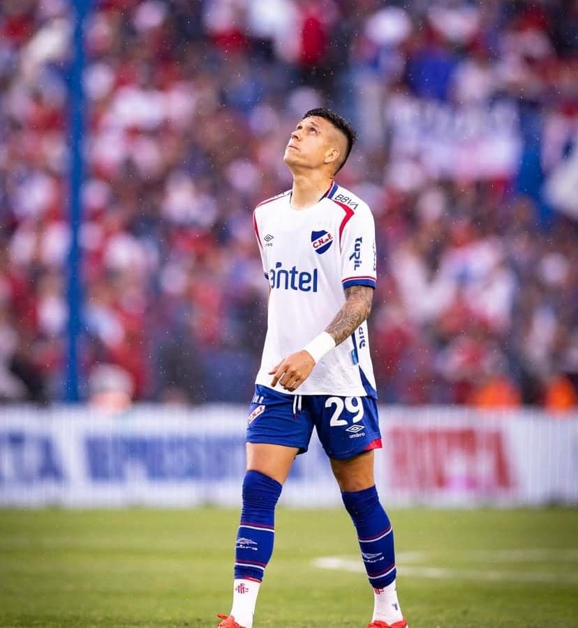 Julián Millán em ação pelo Nacional do Uruguai (Foto: Divulgação)