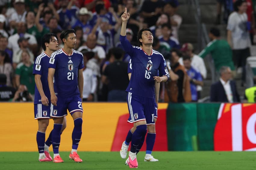 No jogo mil da história das Copas do Mundo, o Japão venceu a Tunísia por 4 a 0 (Foto: Julio Cesar AGUILAR / AFP) grupo f copa