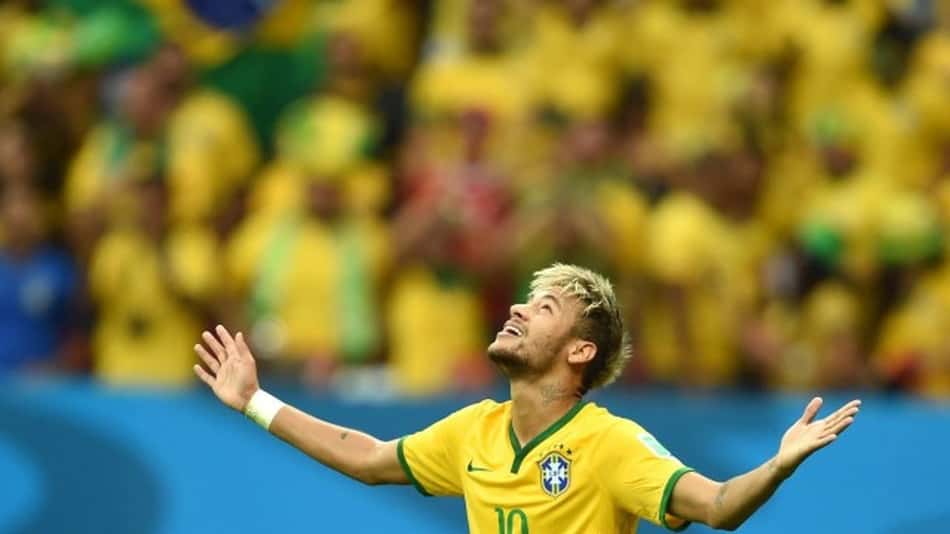Neymar na sua primeira Copa do Mundo, em 2014 (Foto: FRANCOIS XAVIER MARIT / AFP