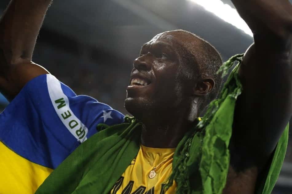 Usain Bolt comemora a conquista da medalha de ouro nos 200 m rasos 