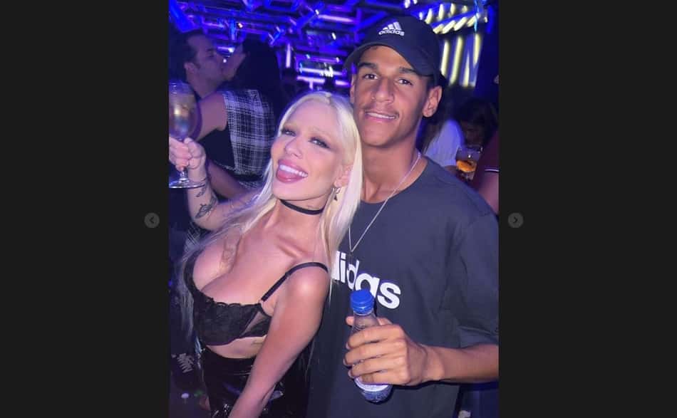 Ex-mulher de Éder Militão posa ao lado de Luva de Pedreiro em noitada na Europa