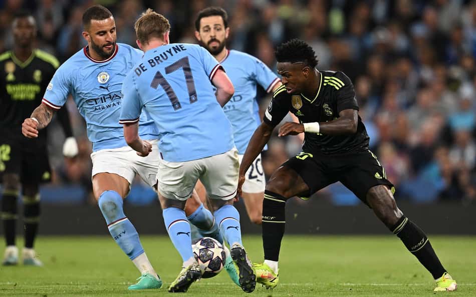AFP__20230517__33FF2KU__v1__HighRes__FblEurC1ManCityRealMadrid-scaled-aspect-ratio-512-320