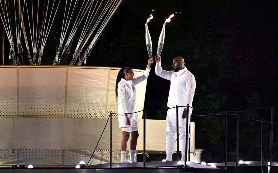 Quem são Teddy Riner e Marie-José Perec, que acenderam a pira olímpica na Abertura das Olimpíadas?