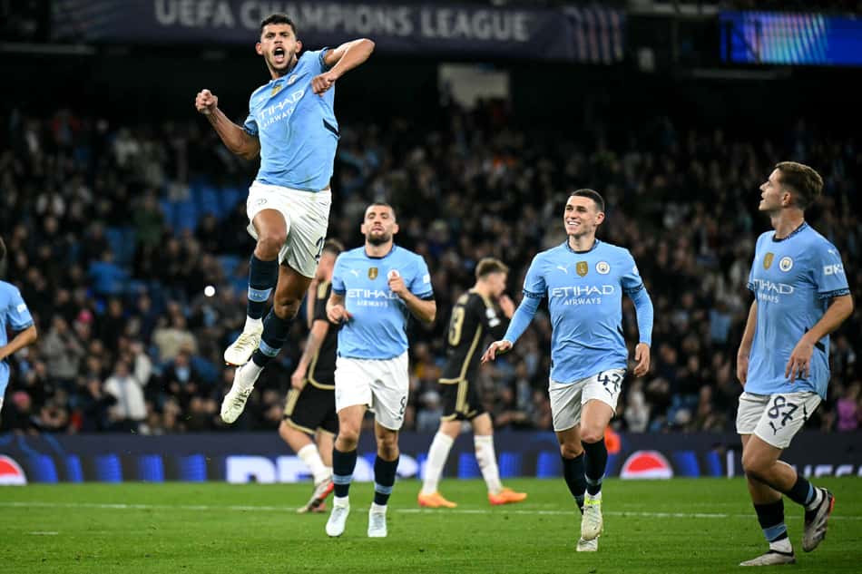 ogadores-do-Manchester-City-comemorando-o-gol