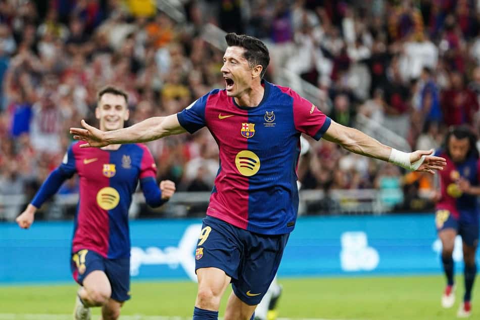 Jeddah, Saudi Arabia. 12th Jan, 2025. Barcelona's Polish player Robert Lewandowski celebrates scoring his team's second goal during the Spanish Super Cup final match El Clasico between FC Barcelona and Real Madrid at King Abdullah Sports City. Final Score