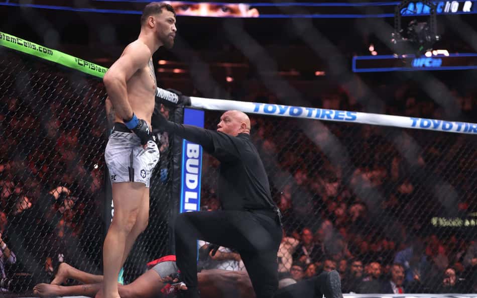 AFP__20250309__2204057875__v1__HighRes__Ufc313PereiraVAnkalaev-scaled-aspect-ratio-512-320